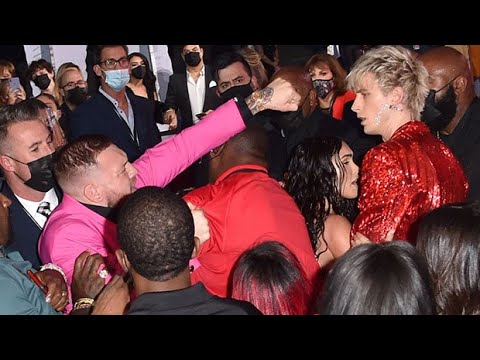 Machine Gun Kelly & Conor McGregor Get Physical On The VMA Red Carpet!
